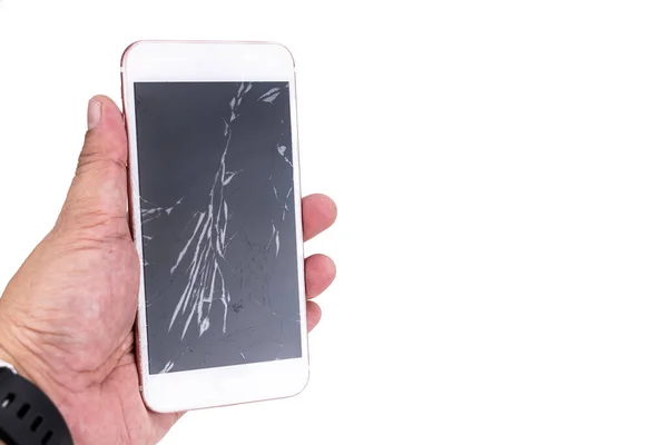 Hand holding smartphone with cracked screen on white background — Stock Photo, Image