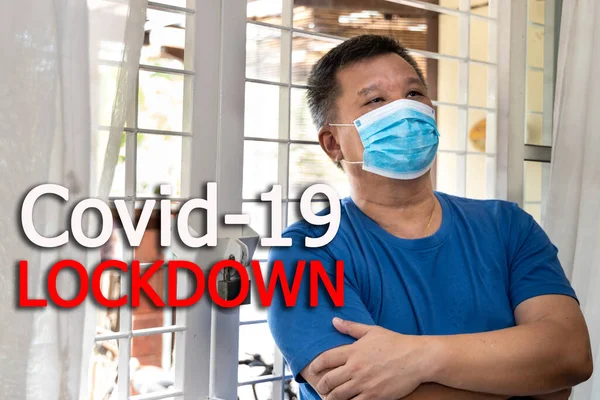 Anxious Mature Chinese Man Face Mask Home Covid Lockdown Text — Stock Photo, Image