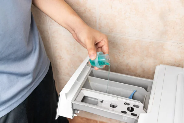 Person Pouring Concentrated Compact Laundry Liquid Detergent Washing Machine Wash — Stock Photo, Image