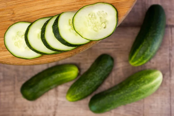 Fresh cucumbers on wooden — Stock Photo, Image