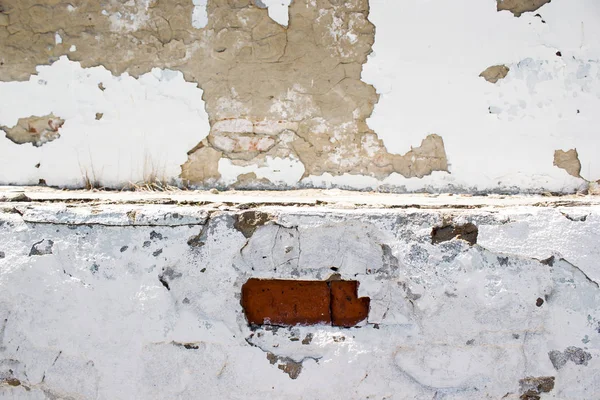 Παλιά τσιμεντένιο τοίχο με μια κατεστραμμένη γύψο — Φωτογραφία Αρχείου