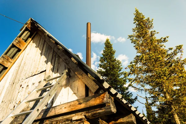 Tourist house with side staircase in the woods