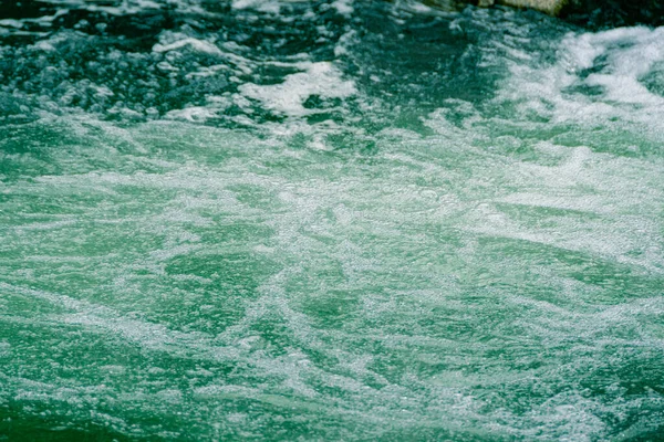 water surface of ocean, sea tide. Rapid flow of river