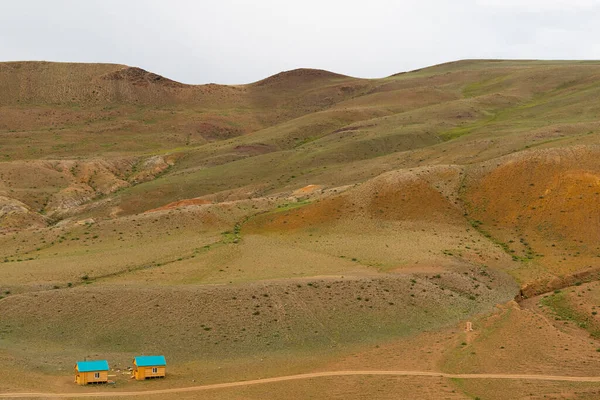 Yellow Hills Ravines Steppe Arid Landscape Clouds Mountains Traces Soil — Stock Photo, Image