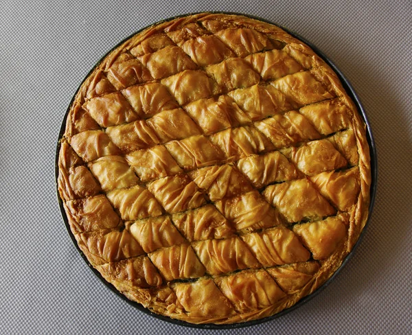 Spinach pie on pan top view