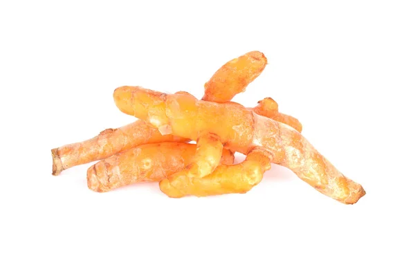 Pile of whole fresh turmeric on white backgreound — ストック写真