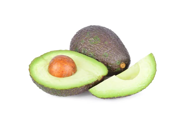 Avocado intero e tagliato con seme su sfondo bianco — Foto Stock