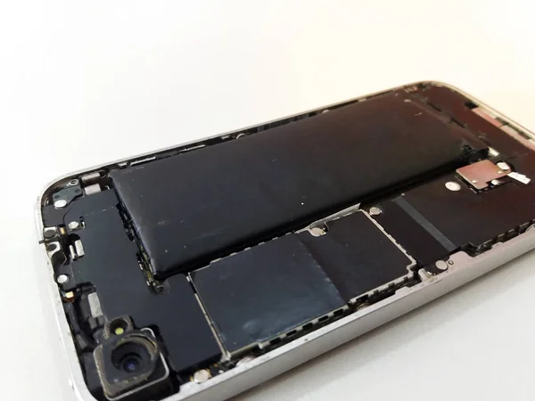 swollen mobile phone battery - old damaged battery