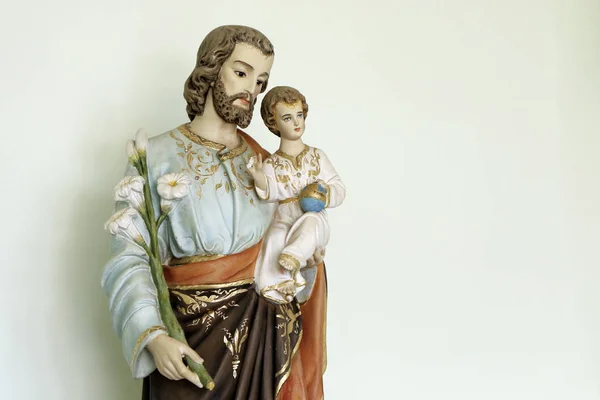 Svatý Josef a malý Ježíšův katolický obraz — Stock fotografie