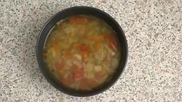 Russian soup of cabbage, schi, poured into a plate. Cooking at home. — Stock Footage Russian soup of cabbage, schi, poured into a plate. Cooking at home. Stock Video