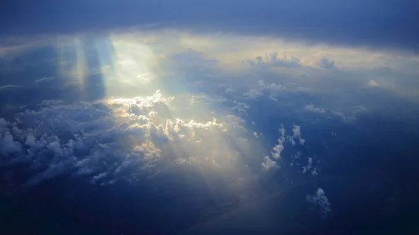 Aerial view of blue cloud with light ray and sun beam — Stock Photo, Image