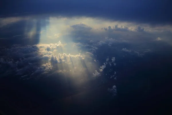 Aerial view of blue cloud with light ray and sun beam — Stock Photo, Image