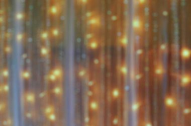 Romantik Led ışık perdesi odak dışı. Konsept tasarımı için bokeh arka plan. Altın ışık düz arka plan kopya alanı için