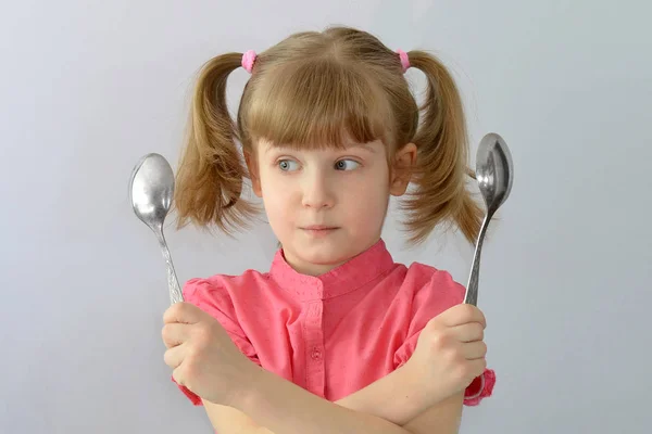 Southpaw lefty left handed Child kid do not know which hand to hold a spoon — Stock Photo, Image