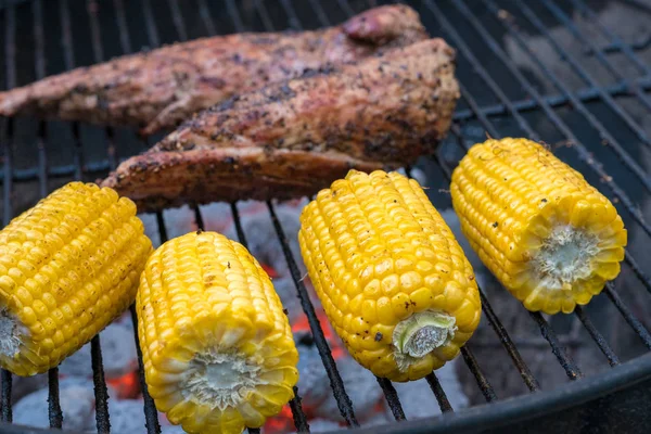 Pork fillets on a barbecue — Stock Photo, Image