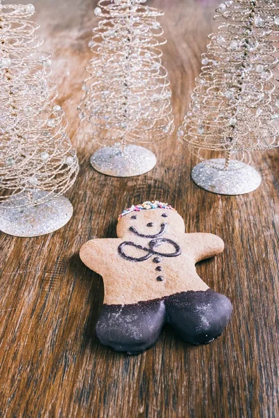 ginger bread man on a wooden table