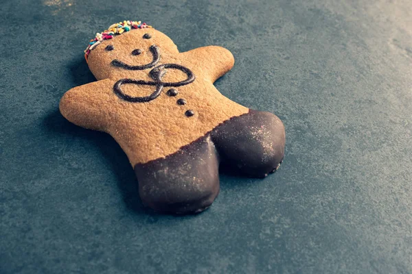 Ginger bread man on a slate — Stock Photo, Image