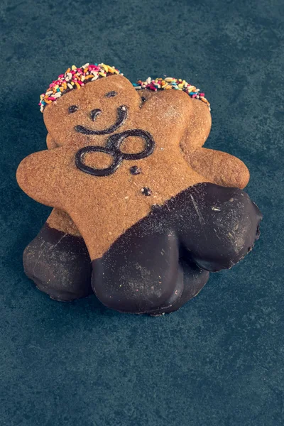 Ginger bread man on a slate — Stock Photo, Image