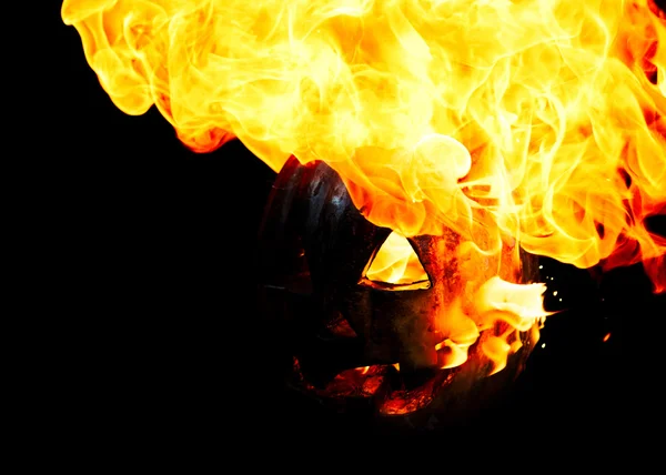 Halloween pumpkin on fire isolated on a black background — Stock Photo, Image