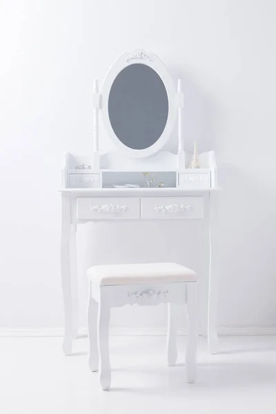 portrait of vintage vanity table mirror set with stool and acces