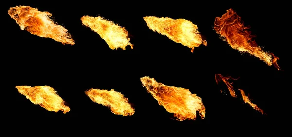 Set of isolated flames on a black background — Stock Photo, Image
