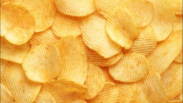 Achtergrond golvende gouden chips met textuur — Stockvideo
