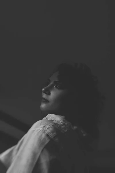 Plus size woman in shirt, monochrome photo with grain. vintage p