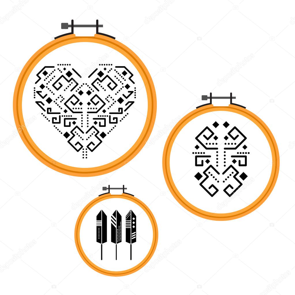 Needlework design on embroidery hoops.