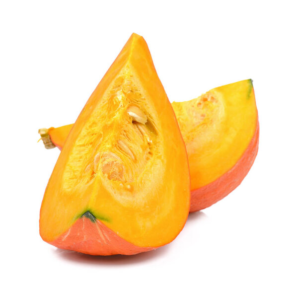 Slice of pumpkin isolated on white background