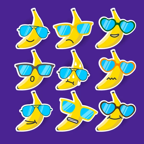 Emojis de banana dos desenhos animados com óculos de sol . —  Vetores de Stock