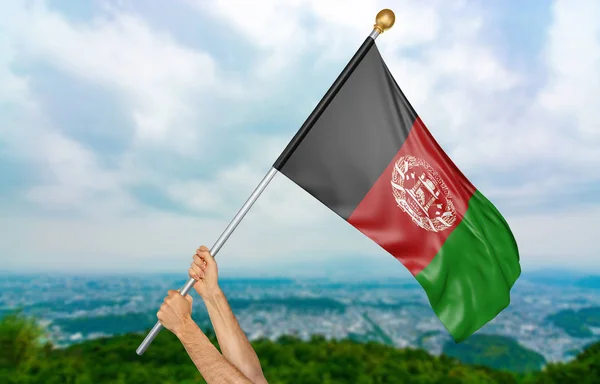 Young man\'s hands proudly waving the Afghanistan national flag in the sky, part 3D rendering