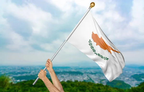 Young man\'s hands proudly waving the Cyprus national flag in the sky, part 3D rendering