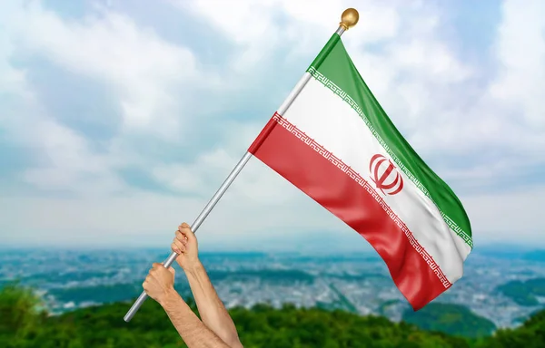 Руки молодого человека с гордостью машут иранским национальным флагом в небе, часть 3D рендеринга — стоковое фото
