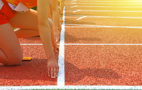 The athletes are at the starting line