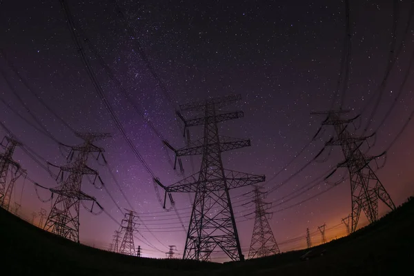 High voltage towers and the Milky Way — Stock Photo, Image