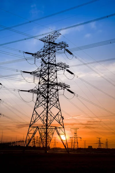 The silhouette of high voltage towers — Stock Photo, Image