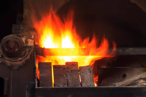 The workshop welder cuts metal