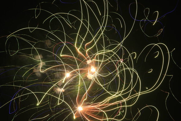 Fireworks burst into the night sky