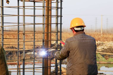 Bridge construction under performing the steel reinforcement of 