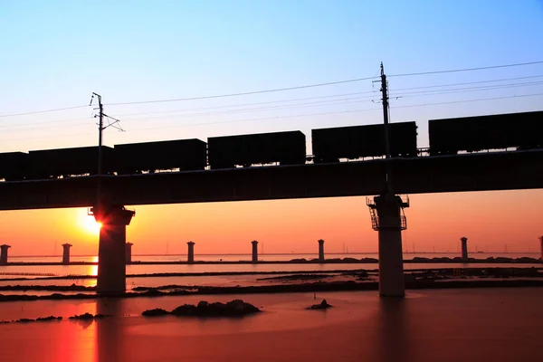 Railway bridge on the sea — Stock Photo, Image