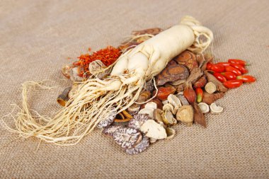 Traditional Chinese medicine (TCM) and ginseng, close-up clipart
