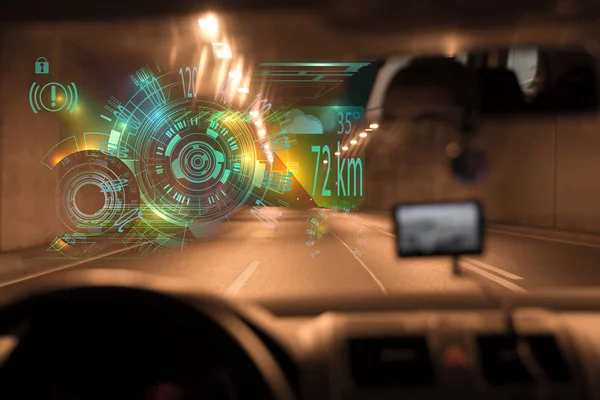 car driving through tunnel; highway tunnel at night.car HUD dashboard. Futuristic user interface HUD and Infographic elements. Abstract virtual graphic touch user interface.