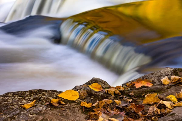 Upper Bond Falls in Autumn with Leaves - Michigan Royalty Free Stock Images