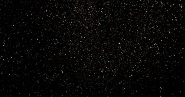 Havai fişek patlaması siyah bir arkaplanda kıvılcım saçar