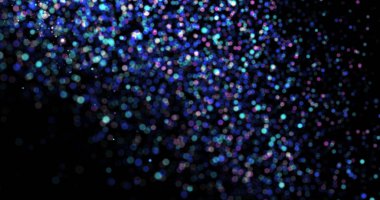 Siyah arkaplanda uçan toz parçacıkları