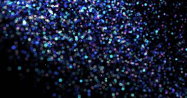 Siyah arkaplanda uçan toz parçacıkları