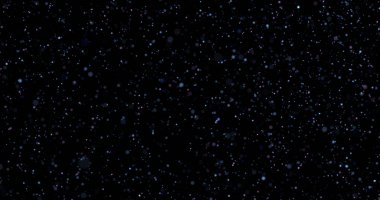 Siyah arkaplanda uçan toz parçacıkları