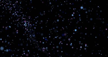 Siyah arkaplanda uçan toz parçacıkları