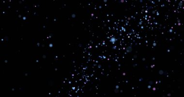 Siyah arkaplanda uçan toz parçacıkları