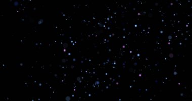 Siyah arkaplanda uçan toz parçacıkları